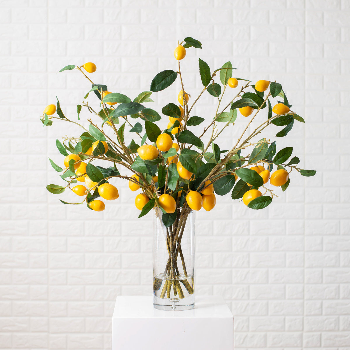 http://darbycreektrading.com/cdn/shop/products/LargeLemonCitrusBranchEverydaySpringArrangementinGlassVase3_1200x1200.jpg?v=1599230653