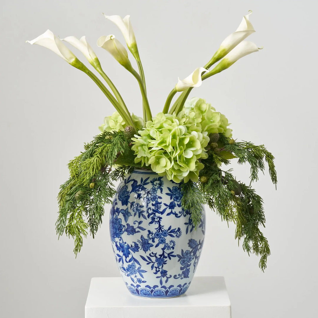 white hydrangea and calla lily bouquet Lux Wintergreen