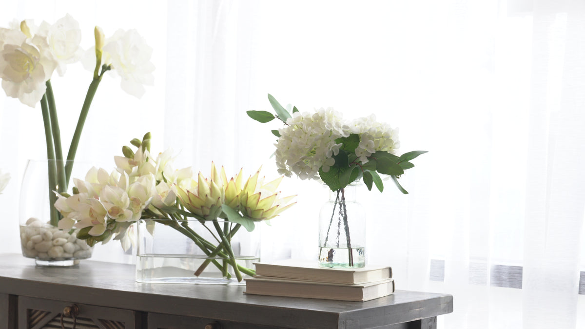 White Hydrangea & Seeded Eucalyptus In Vintage Glass Bottle Water Illu ...