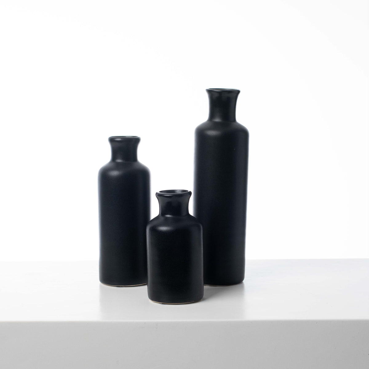 Black Matte Metal Round Bottle Bud Vase Collection Darby Creek Trading