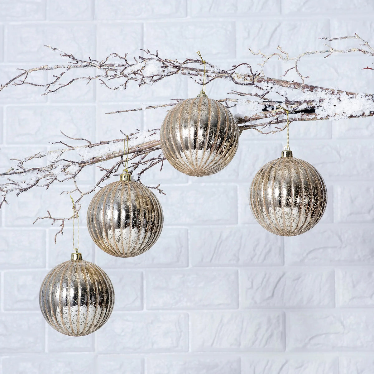 Gold mercury glass Christmas ornaments with vintage mottled finish
